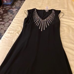 Cache long black gown with metal around the v neck SizeSmall
